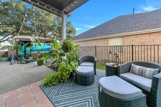 a view of outdoor sitting area with furniture