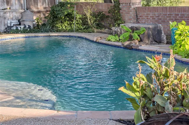 a view of a lake with a garden