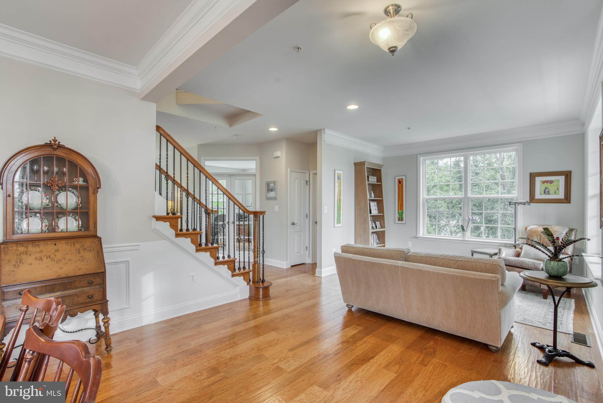 2344 Sweet Meadow Road Baltimore, MD 21209 - Photo 16 of 76 a living room with furniture and a large window