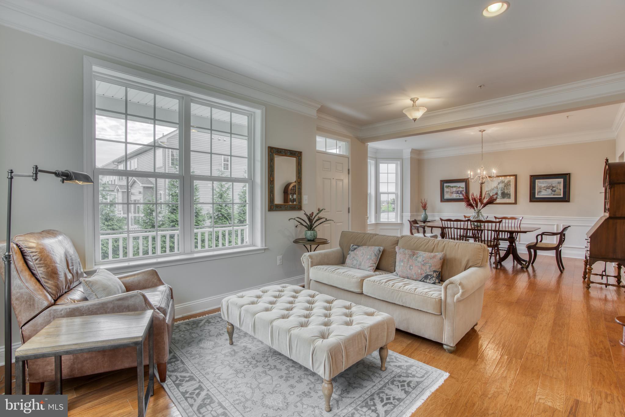 2344 Sweet Meadow Road Baltimore, MD 21209 - Photo 19 of 76 a living room with furniture and a large window