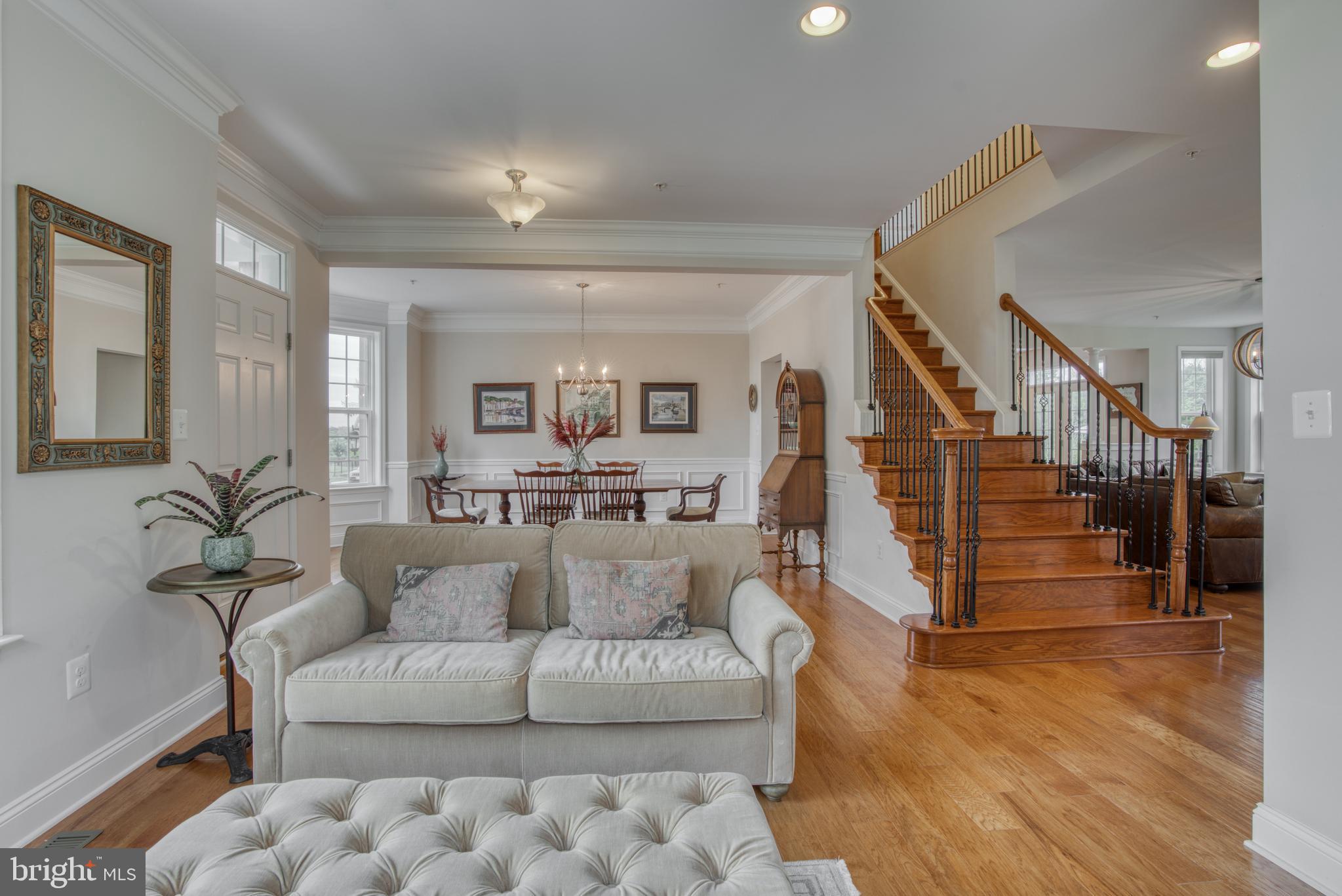 2344 Sweet Meadow Road Baltimore, MD 21209 - Photo 20 of 76 a living room with furniture and wooden floor