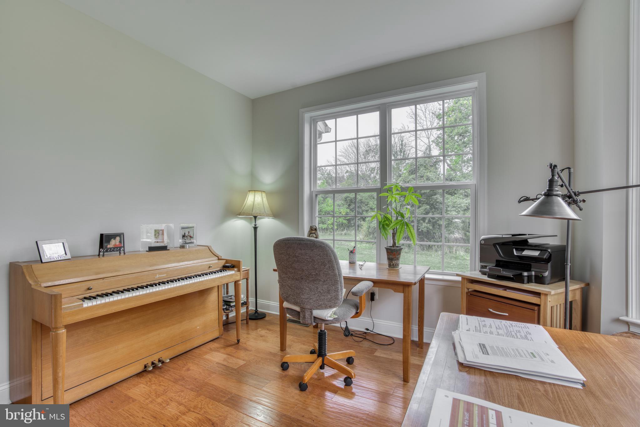 2344 Sweet Meadow Road Baltimore, MD 21209 - Photo 39 of 76 a bedroom with a workspace
