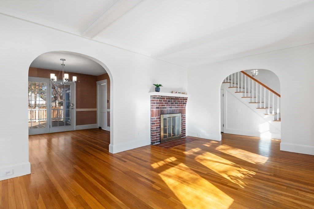 6 Stone Street Saugus, MA 01906 - Photo 12 of 39 wooden floor in an empty room with a window