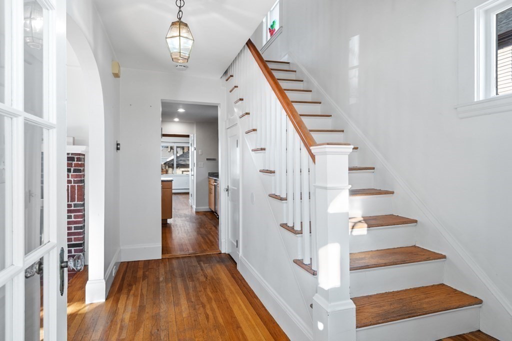6 Stone Street Saugus, MA 01906 - Photo 18 of 39 a view of entryway and hall with wooden floor