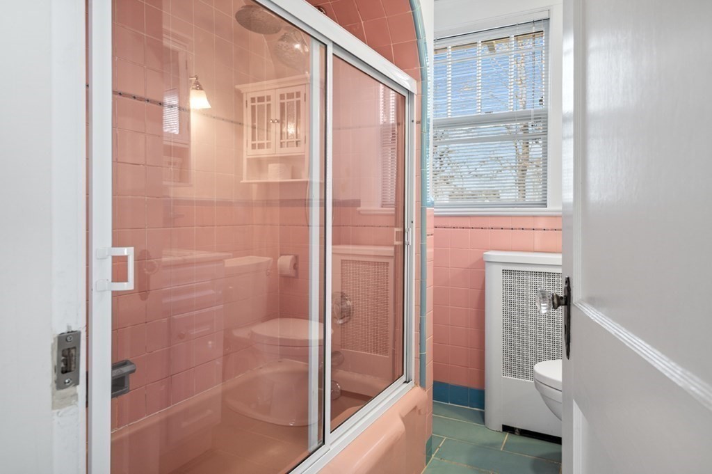 6 Stone Street Saugus, MA 01906 - Photo 20 of 39 a bathroom with a bathtub and a shower