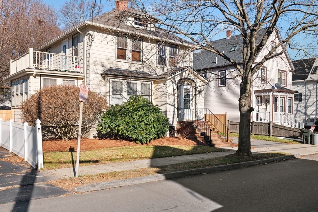 6 Stone Street Saugus, MA 01906 - Photo 2 of 39 a view of a white building among the street