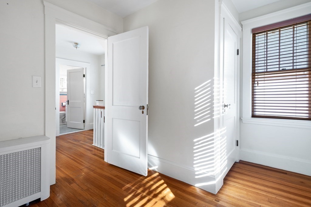 6 Stone Street Saugus, MA 01906 - Photo 27 of 39 a view of wooden floor and closet in a room