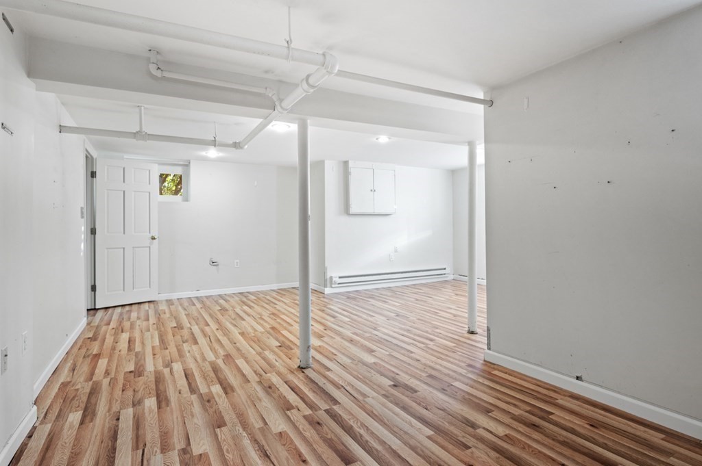 6 Stone Street Saugus, MA 01906 - Photo 30 of 39 a view of empty room with wooden floor