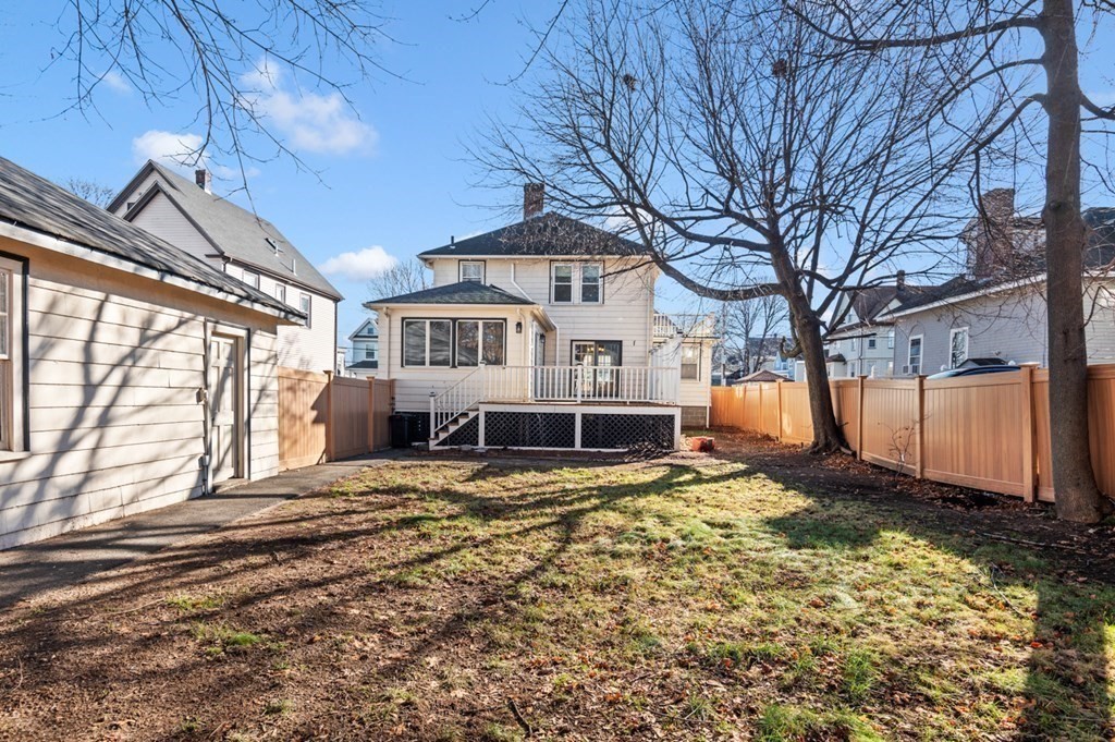 6 Stone Street Saugus, MA 01906 - Photo 3 of 39 a view of a house with snow on the wall