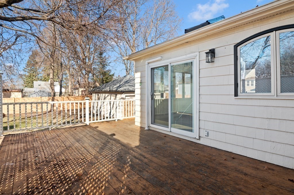 6 Stone Street Saugus, MA 01906 - Photo 32 of 39 a view of a house with a wooden fence