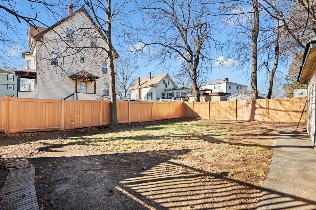 6 Stone Street Saugus, MA 01906 - Photo 34 of 39 a view of a backyard of a house