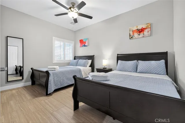 a bathroom with a sink toilet and a mirror