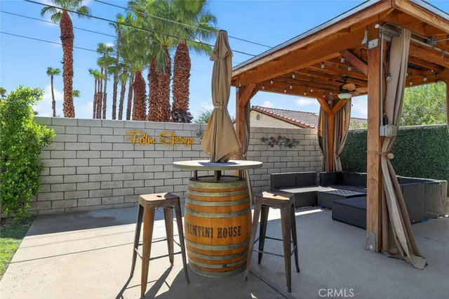 a view of a park with palm trees