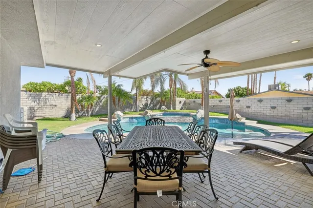a view of a porch with furniture