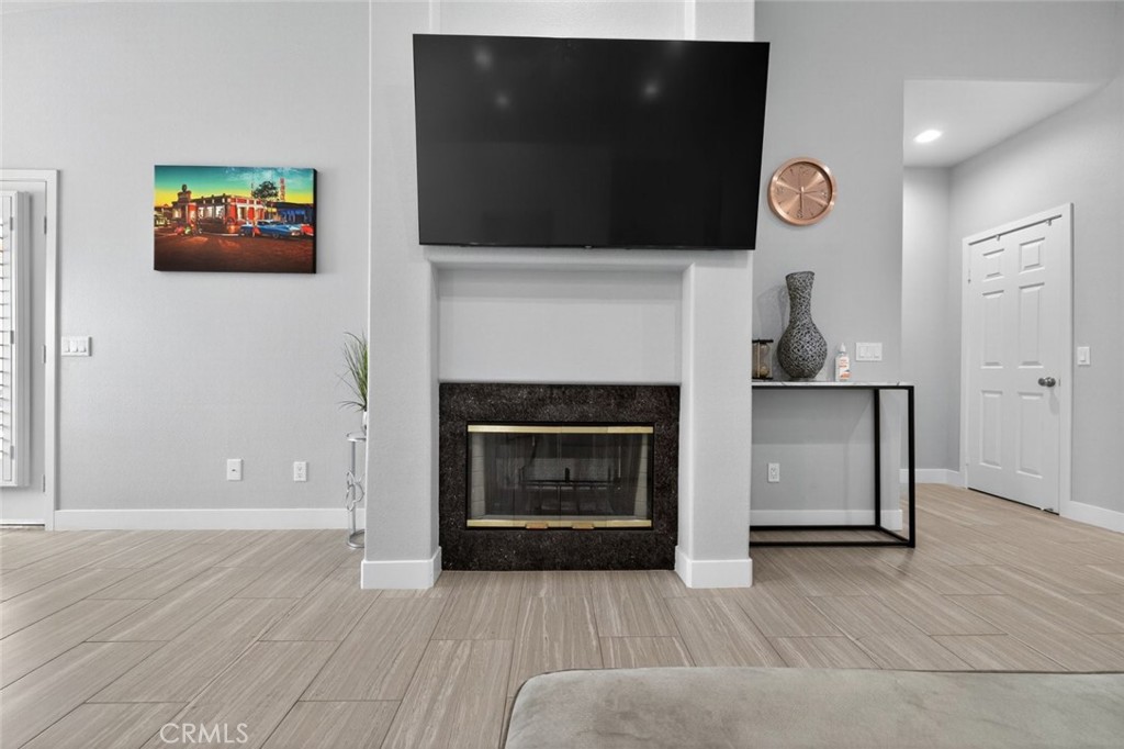 2120 West Nicola Road Palm Springs, CA 92262 - Photo 4 of 30 a living room with furniture and a fireplace