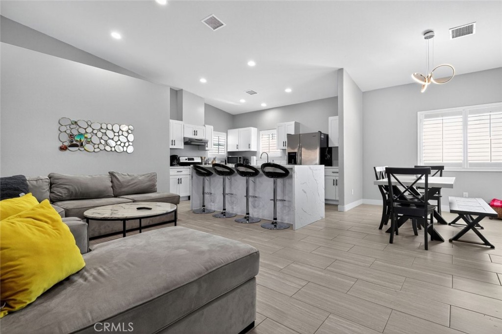2120 West Nicola Road Palm Springs, CA 92262 - Photo 5 of 30 a living room with furniture and kitchen view