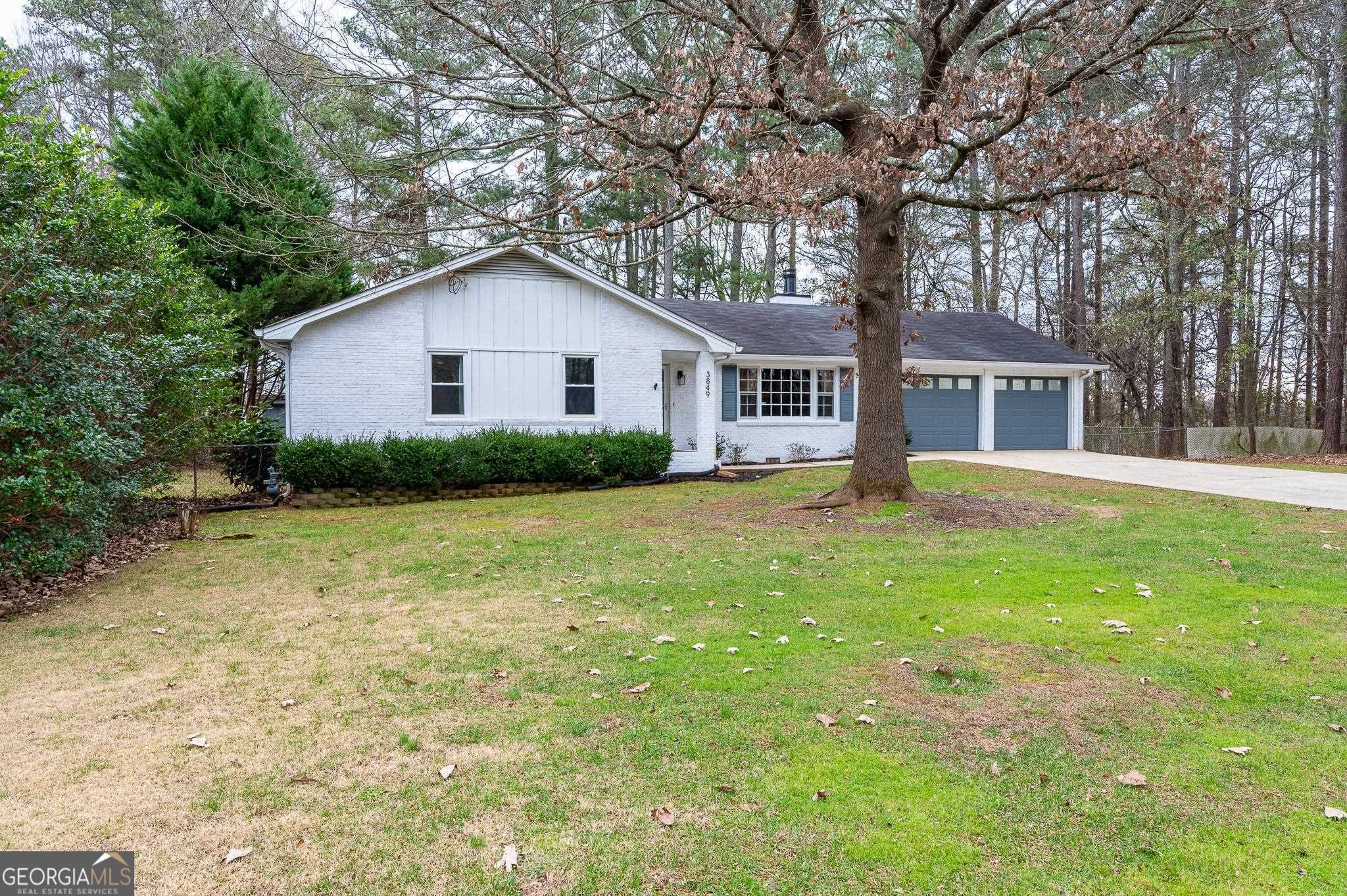 a house view with a garden space