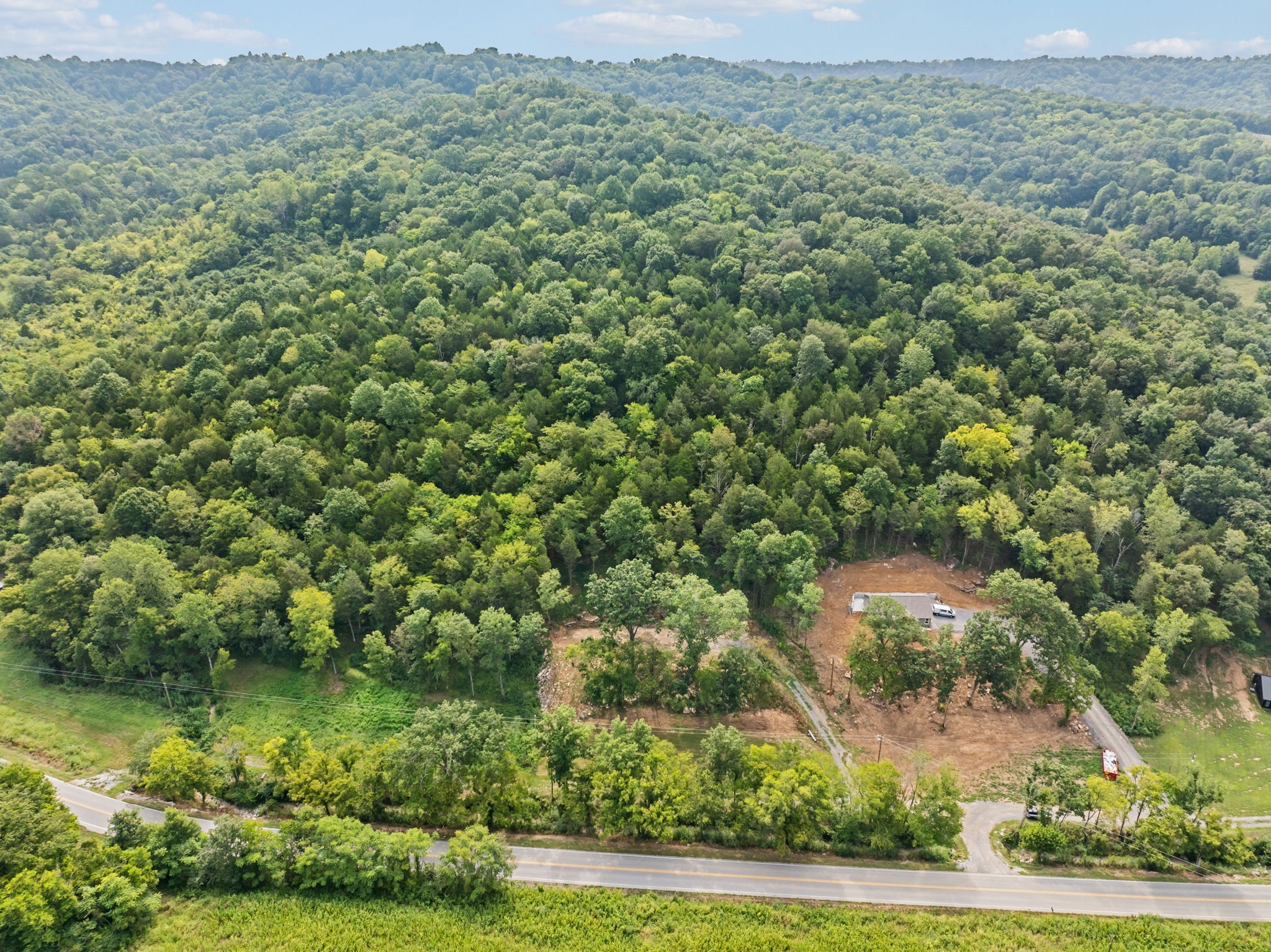 0 Stonewall Highway Carthage, TN 37030 - Photo 7 of 23 an aerial view of residential houses with outdoor space and trees