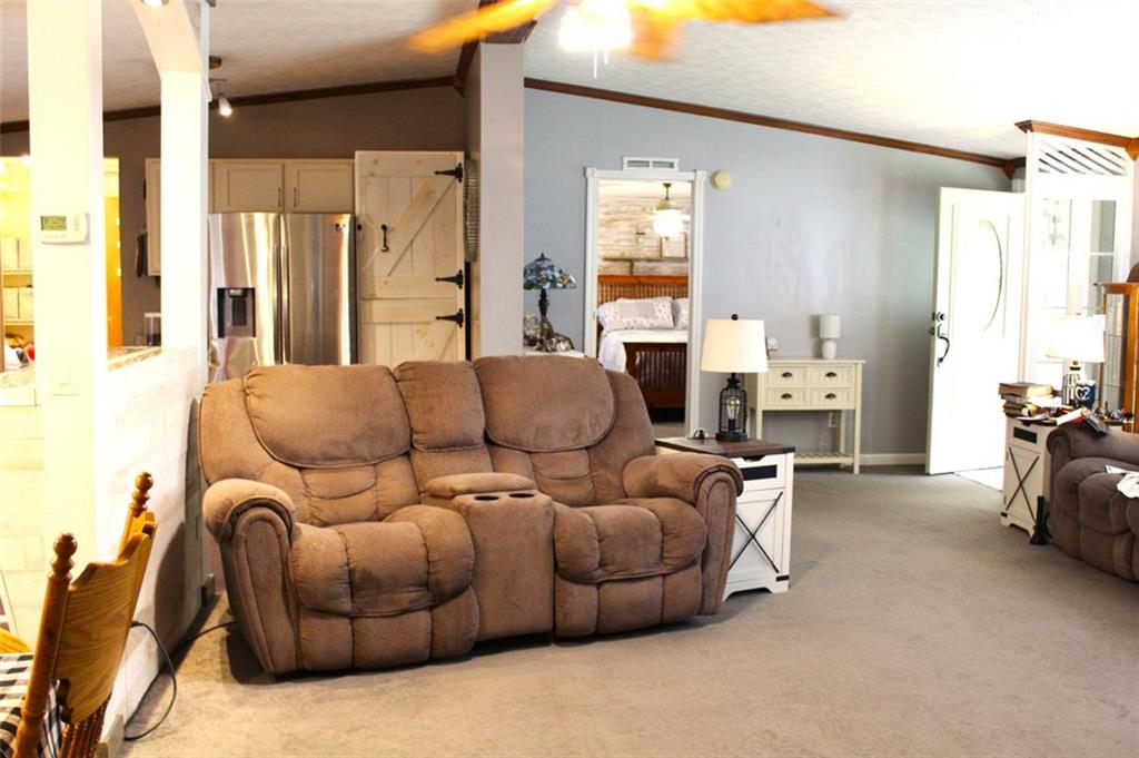 396 Old Harden Orchard Road Commerce, GA 30529 - Photo 11 of 21 a living room with furniture and a large window
