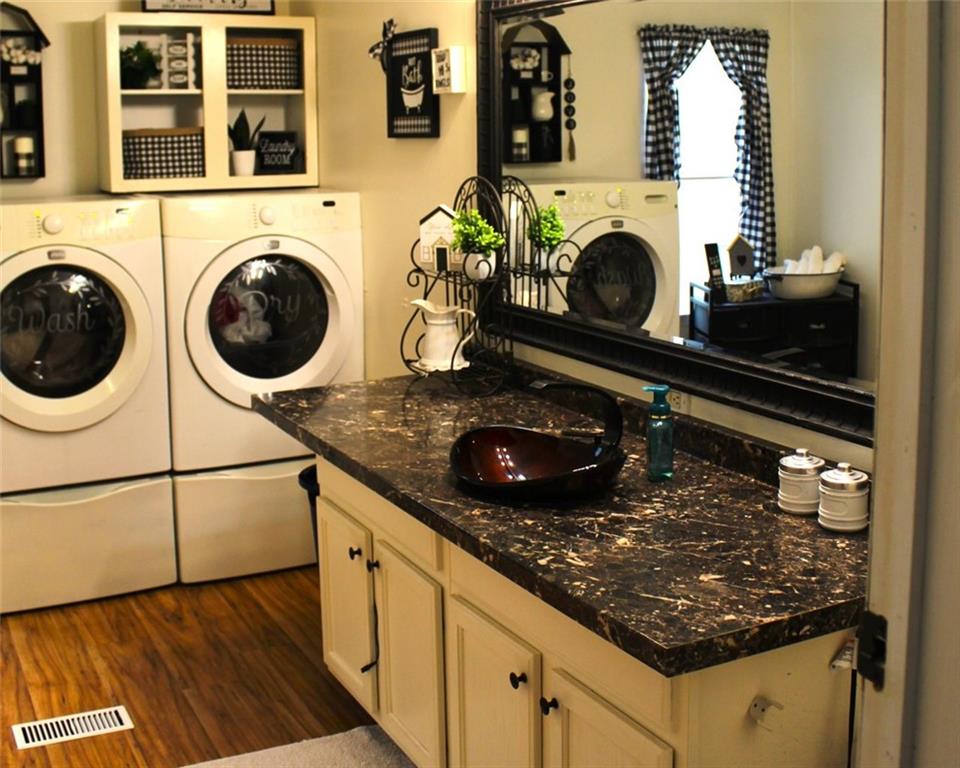 396 Old Harden Orchard Road Commerce, GA 30529 - Photo 15 of 21 a kitchen with stove top oven and cabinets