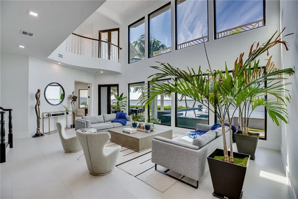a view of furniture and floor to ceiling window