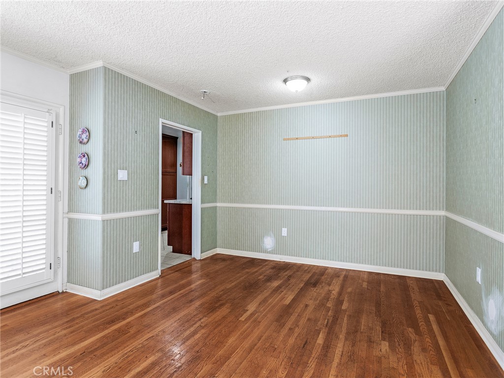 2724 Scott Road Burbank, CA 91504 - Photo 12 of 43 an empty room with wooden floor and closet