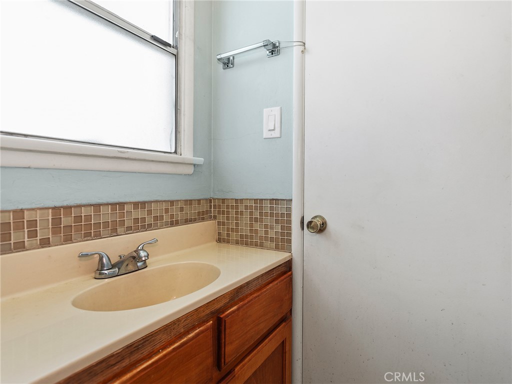 2724 Scott Road Burbank, CA 91504 - Photo 21 of 43 a bathroom with a sink and a mirror