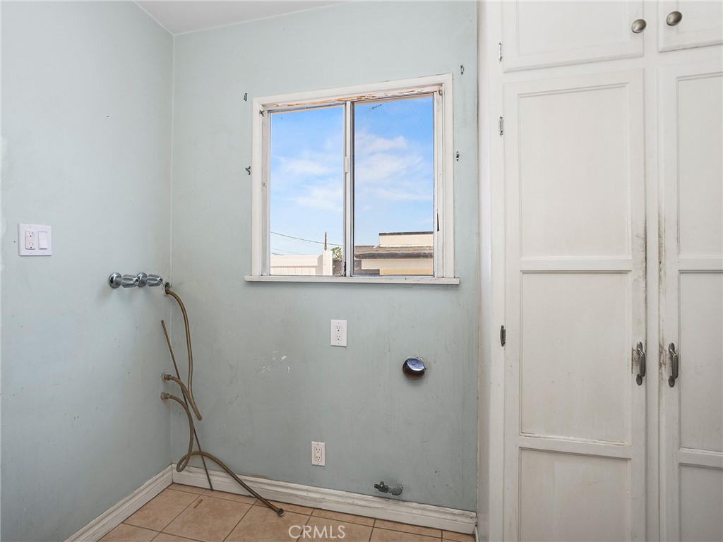 2724 Scott Road Burbank, CA 91504 - Photo 22 of 43 a bathroom with a granite countertop sink and shower