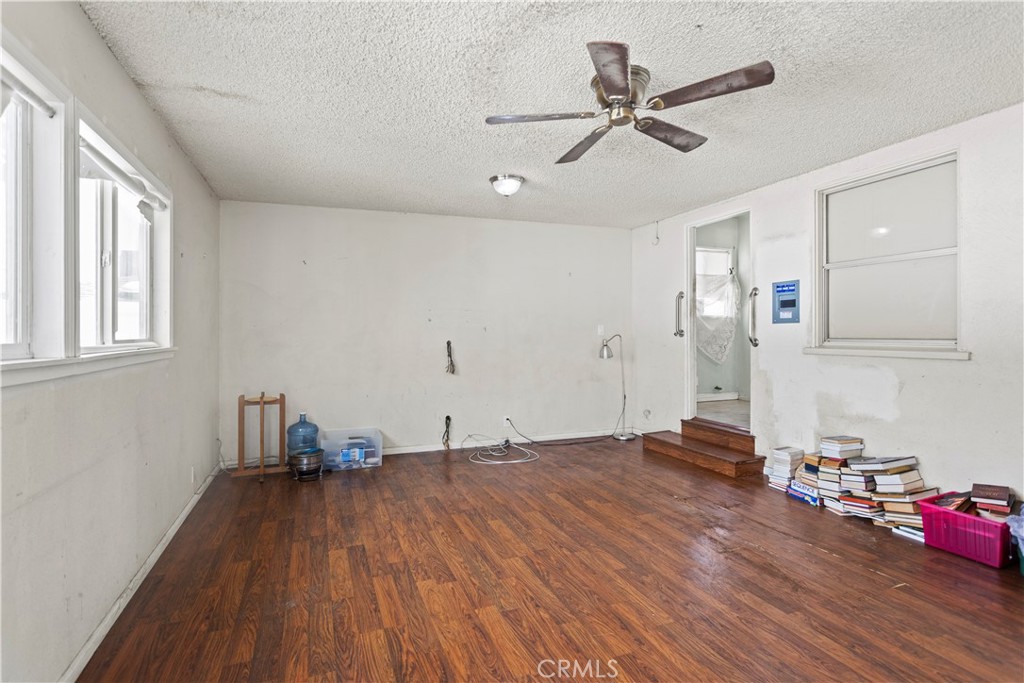 2724 Scott Road Burbank, CA 91504 - Photo 24 of 43 a view of empty room with wooden floor and ceiling fan