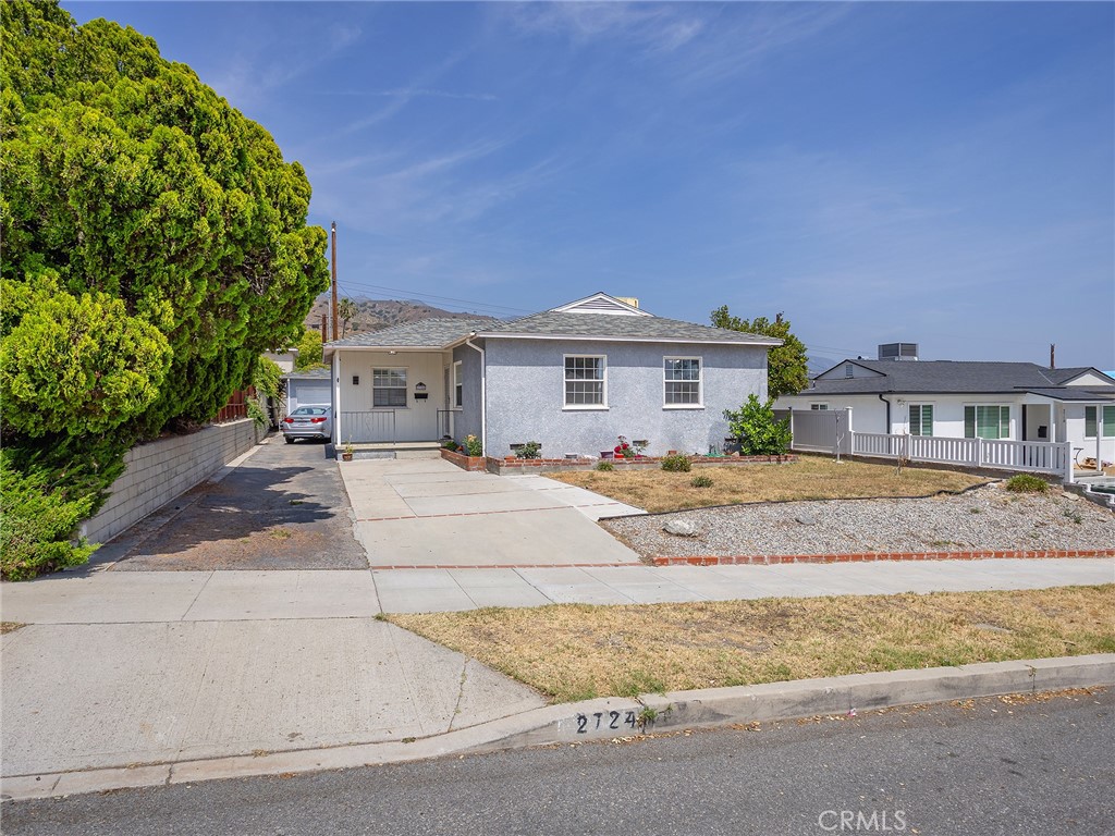 2724 Scott Road Burbank, CA 91504 - Photo 3 of 43 a front view of a house with a yard