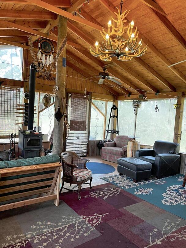 5 West A W Chapel Road Laurel Hill, FL 32567 - Photo 12 of 14 a roof deck with couch and chairs