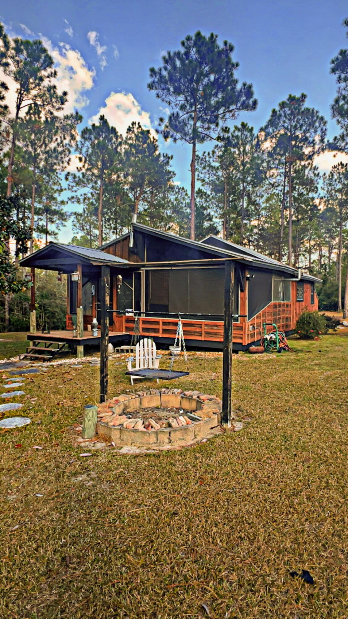 5 West A W Chapel Road Laurel Hill, FL 32567 - Photo 2 of 14 a view of swimming pool with chairs
