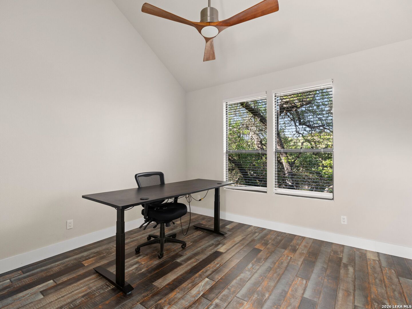 1146 Victoria Avenue Spring Branch, TX 78070 - Photo 37 of 89 a view of a workspace with furniture and a window