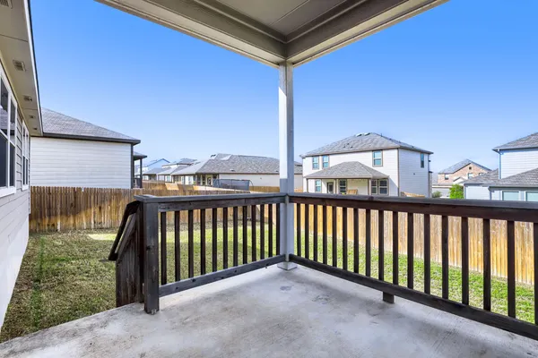 a view of balcony with furniture