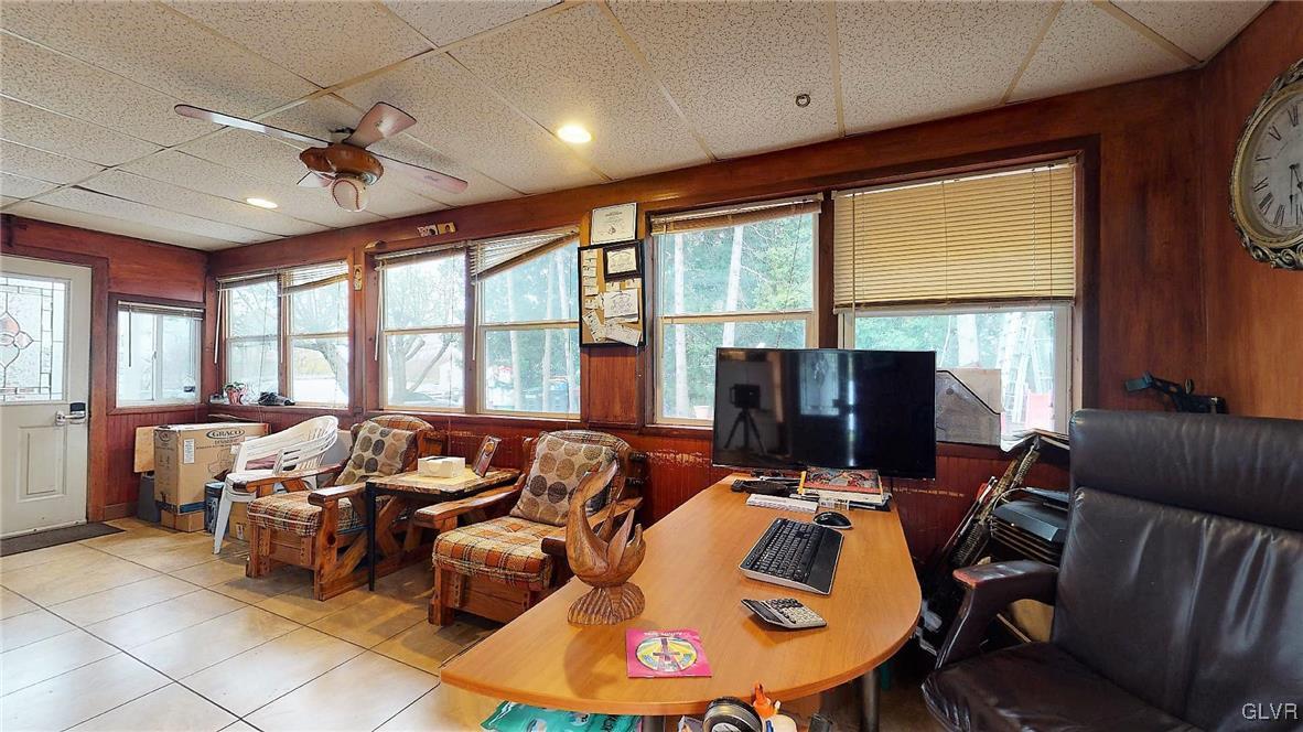 712 2nd Street Catasauqua, PA 18032 - Photo 16 of 36 a room with furniture a flat screen tv and a large window