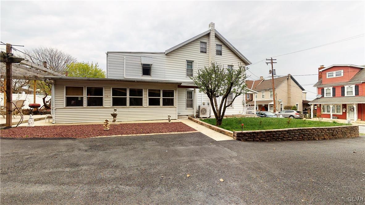 712 2nd Street Catasauqua, PA 18032 - Photo 3 of 36 front view of a house with a yard