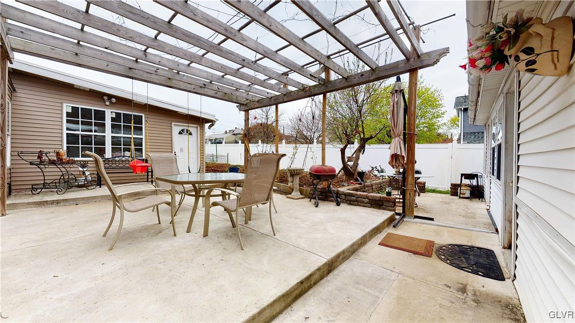 712 2nd Street Catasauqua, PA 18032 - Photo 34 of 36 a building outdoor space with patio furniture and potted plants
