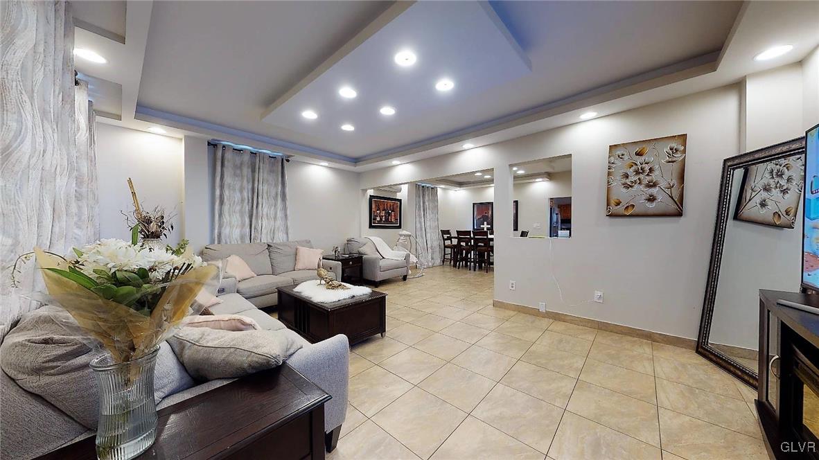 712 2nd Street Catasauqua, PA 18032 - Photo 4 of 36 a lobby with furniture and a potted plant