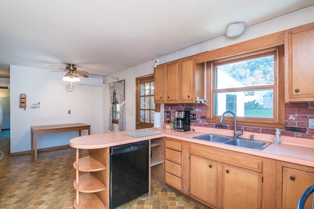 8 Sunset Drive Montague, MA 01376 - Photo 11 of 29 a kitchen with a sink stove and cabinets