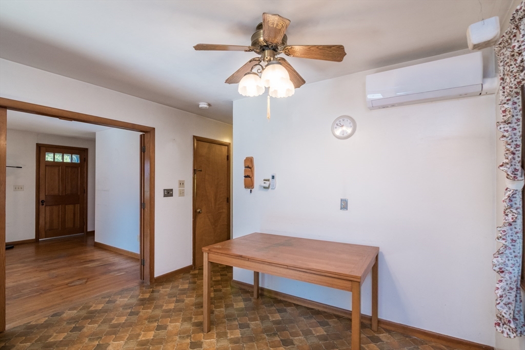 8 Sunset Drive Montague, MA 01376 - Photo 14 of 29 a room with chandelier fan and wooden floor