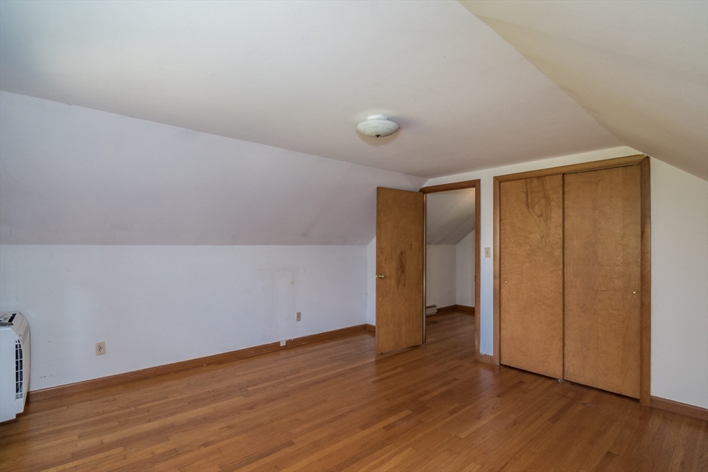 8 Sunset Drive Montague, MA 01376 - Photo 23 of 29 a view of an empty room with wooden floor and closet