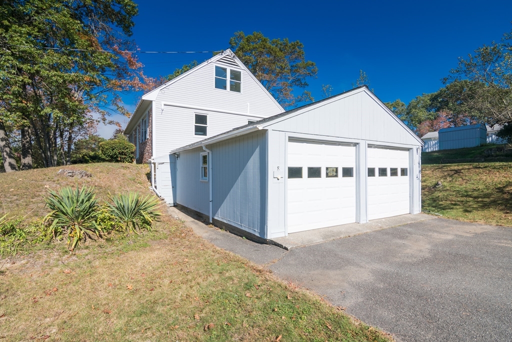 8 Sunset Drive Montague, MA 01376 - Photo 5 of 29 a view of a white house with a yard and large trees
