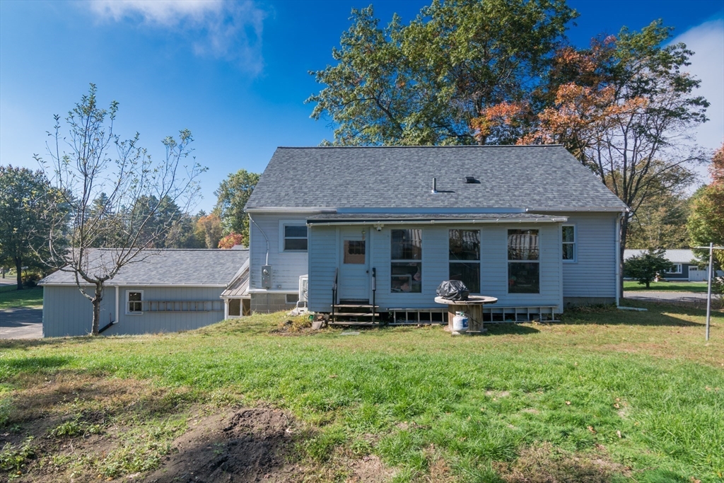 8 Sunset Drive Montague, MA 01376 - Photo 7 of 29 a view of a house with sitting area and garden