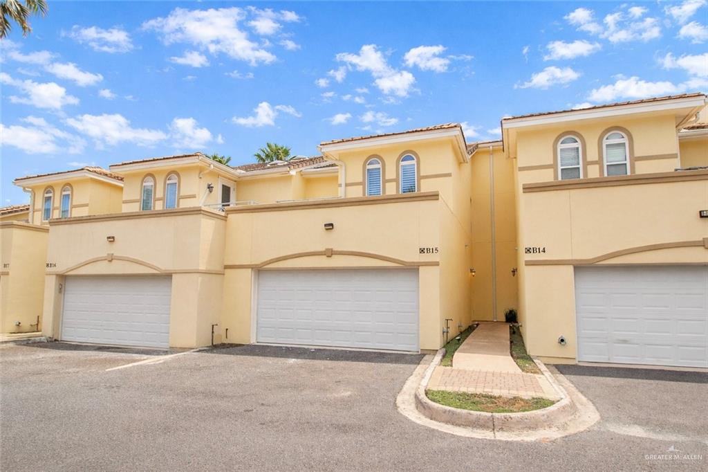 a view of a house with a garage