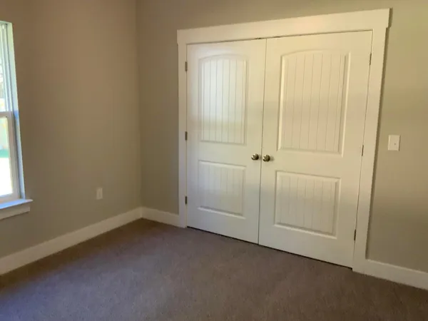 an empty room with a door