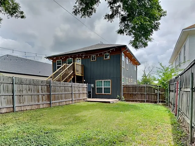 a view of backyard with deck