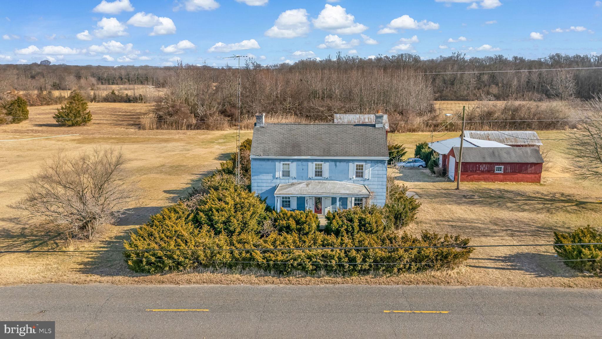 321 Jones Island Road Cedarville, NJ 08311 - Photo 2 of 39 a view of a lake with a house