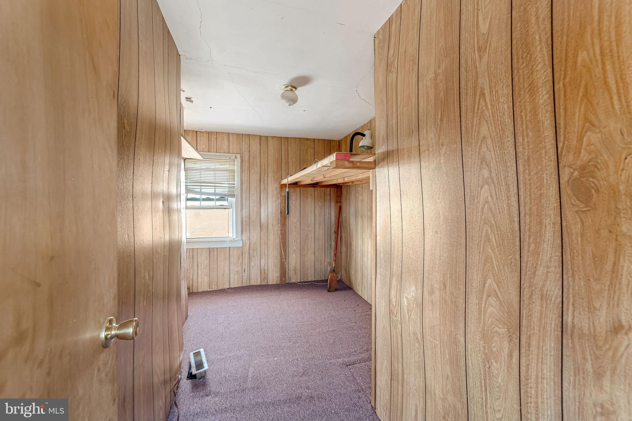 321 Jones Island Road Cedarville, NJ 08311 - Photo 31 of 39 a view of a livingroom with a staircase