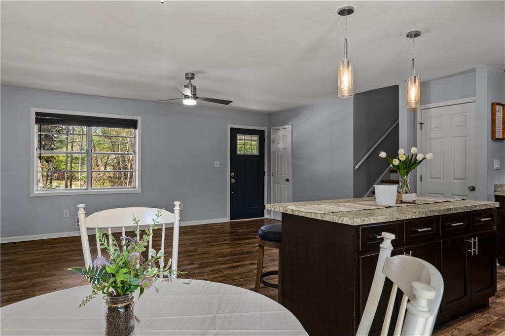 3990 Pine Mountain Road Northwest Kennesaw, GA 30152 - Photo 15 of 32 a vase of flowers sitting on a table chair