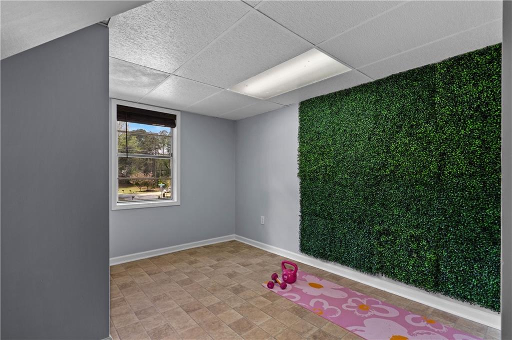 3990 Pine Mountain Road Northwest Kennesaw, GA 30152 - Photo 23 of 32 a view of an empty room with a window